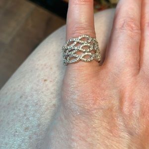 This is 925 sterling silver ring of all clear stones not diamonds.